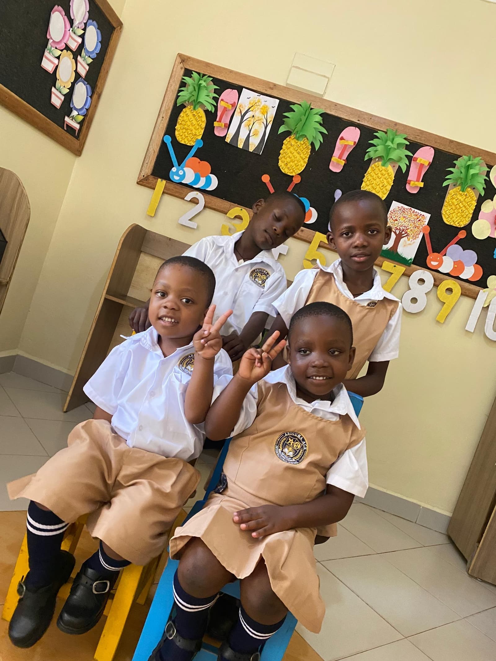 Pre-school children in Ariguma ACE uniform in their classroom